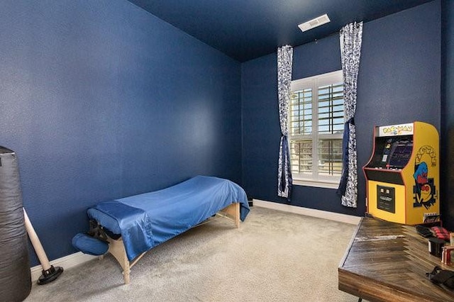 bedroom featuring carpet