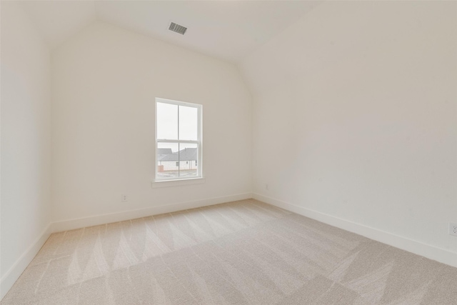 3231 Fisher Rd, Rockwall, TX 75032 - spare room with light carpet, lofted ceiling, and baseboards