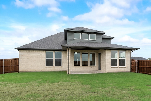 3231 Fisher Rd, Rockwall, TX 75032 - back of house featuring a patio area, a shingled roof, and brick siding