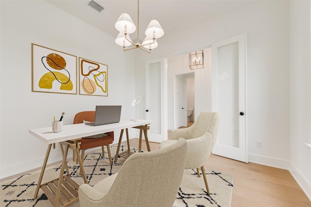 3231 Fisher Rd, Rockwall, TX 75032 - empty room featuring a chandelier, light wood-type flooring, and baseboards