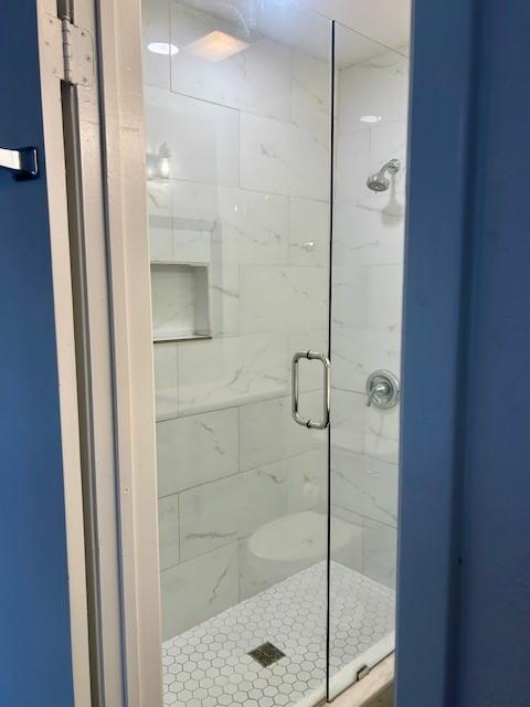 bathroom with walk in shower