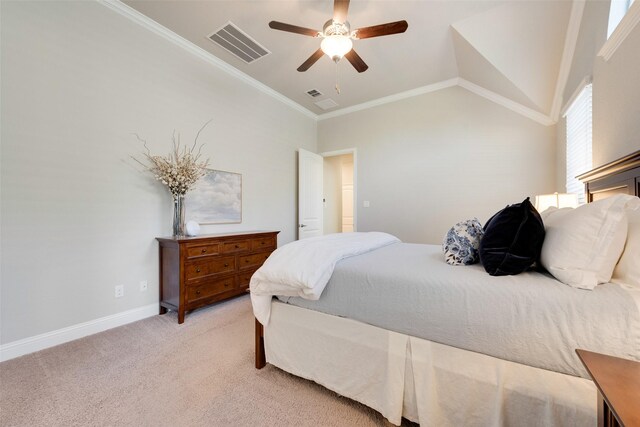 carpeted bedroom with lofted ceiling, ceiling fan, and crown molding