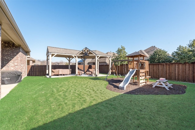 view of yard with a playground