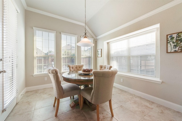 dining room featuring light tile patterned flooring, lofted ceiling, and ornamental molding