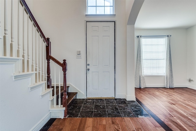 foyer entrance featuring hardwood / wood-style floors