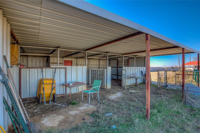 view of patio / terrace with an outbuilding