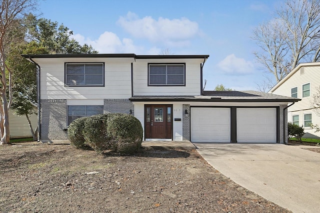 front of property featuring a garage