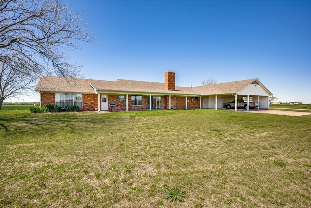 single story home with a carport and a front lawn