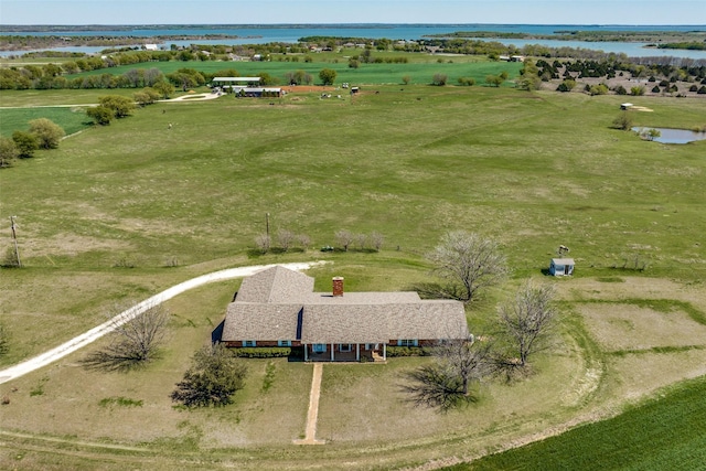 bird's eye view featuring a water view and a rural view