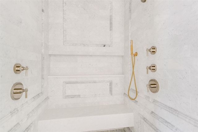 interior details featuring walk in shower