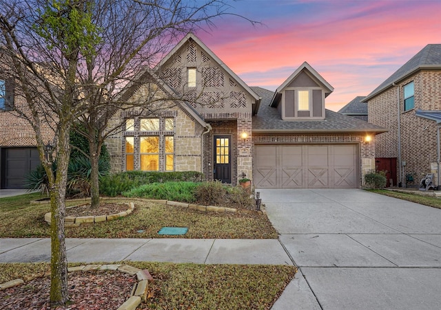 view of front of property with a garage