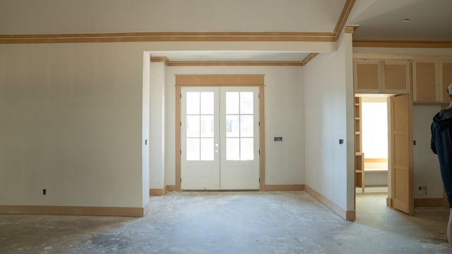 doorway to outside with french doors and crown molding