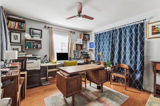 office area featuring light wood-type flooring and ceiling fan