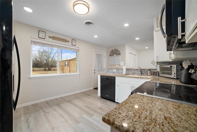 kitchen featuring dishwasher, white cabinets, refrigerator, sink, and light wood-type flooring