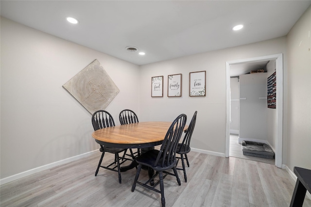 dining area featuring light hardwood / wood-style floors