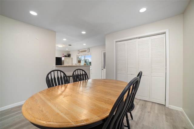 dining room featuring light wood-type flooring