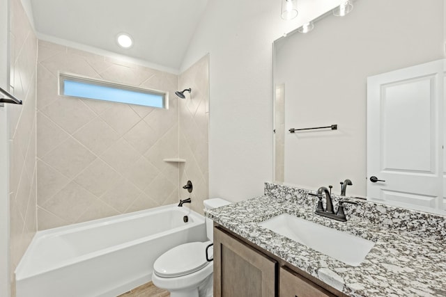 full bathroom with vaulted ceiling,  shower combination, vanity, and toilet