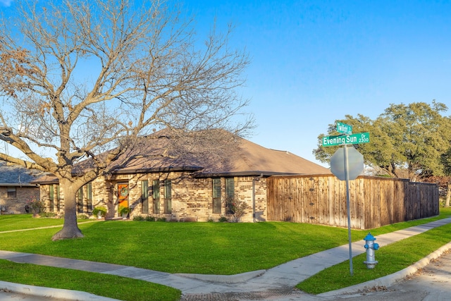 view of front of home with a front lawn