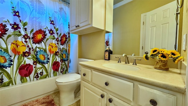 full bathroom with tile patterned floors, ornamental molding, vanity, shower / bath combo with shower curtain, and toilet