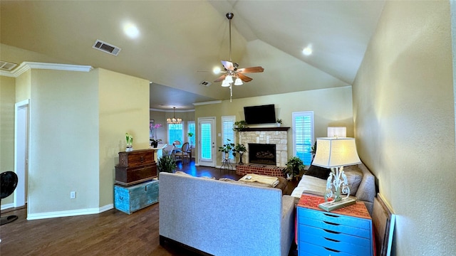 living room with dark hardwood / wood-style flooring, a fireplace, ceiling fan with notable chandelier, and lofted ceiling