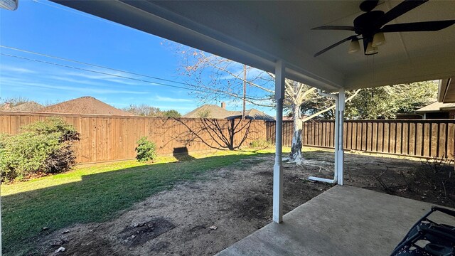 view of yard featuring ceiling fan