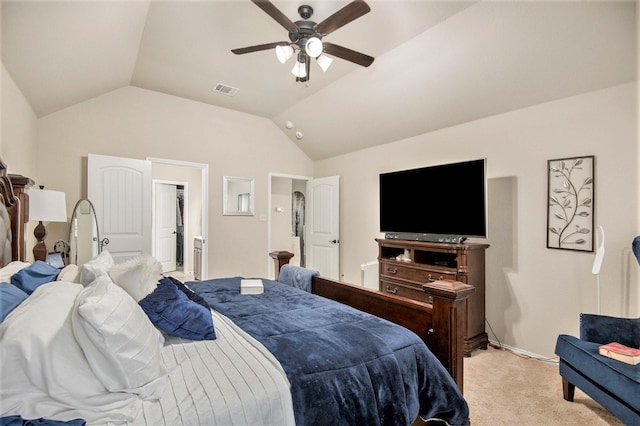 carpeted bedroom with ceiling fan and lofted ceiling