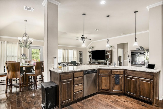 kitchen with light stone countertops, crown molding, dark brown cabinetry, and stainless steel appliances