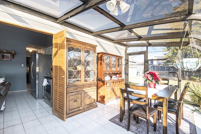 sunroom / solarium featuring beamed ceiling and coffered ceiling