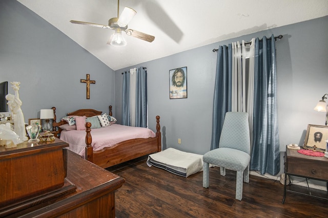 bedroom with dark hardwood / wood-style floors, ceiling fan, and lofted ceiling