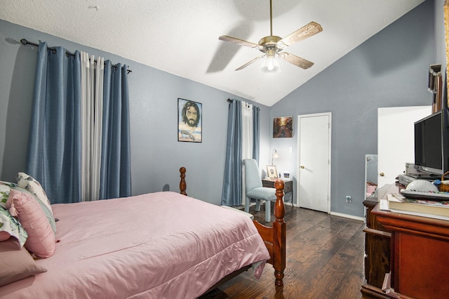 bedroom featuring vaulted ceiling, ceiling fan, and dark wood-type flooring