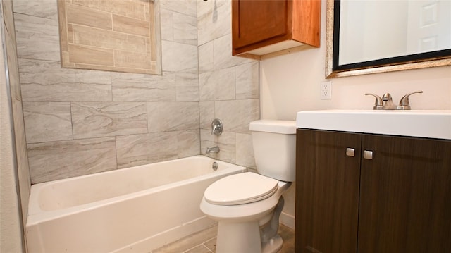 full bathroom with vanity, tiled shower / bath, and toilet