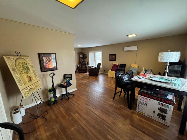 office area with dark hardwood / wood-style floors and an AC wall unit