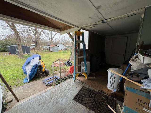 view of patio / terrace with a storage unit