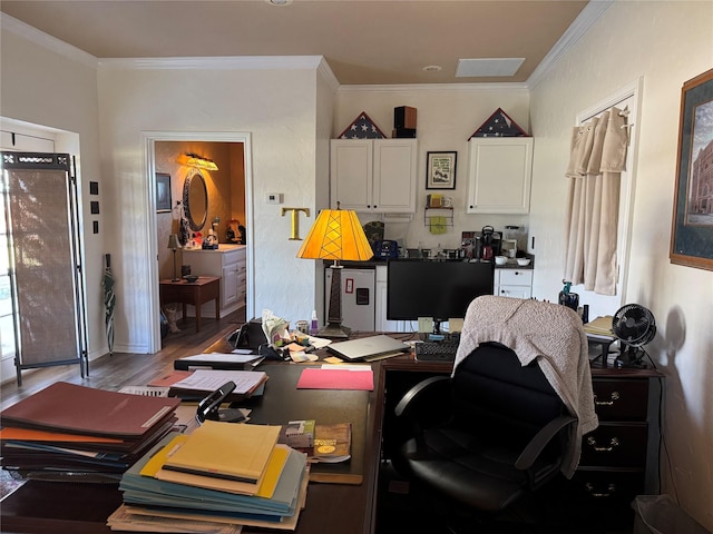 office with hardwood / wood-style floors and ornamental molding