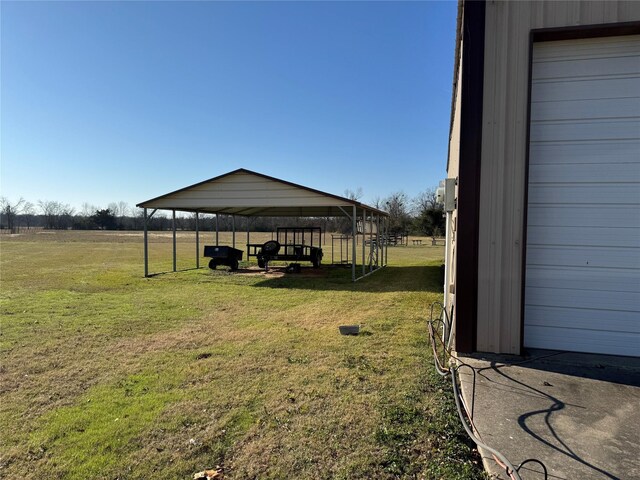 view of yard featuring a carport