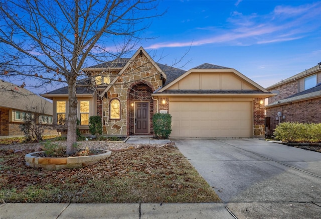 view of front of home with a garage