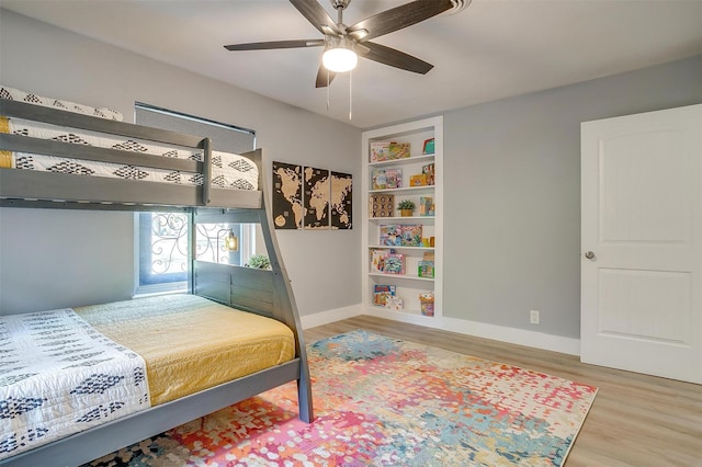 bedroom featuring ceiling fan and light hardwood / wood-style flooring