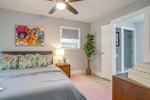 bedroom with light wood-type flooring and ceiling fan