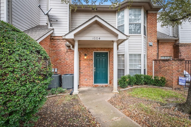 entrance to property with central AC unit