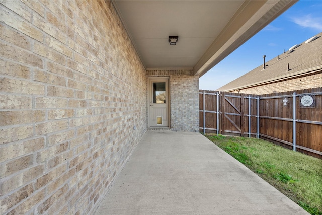 doorway to property featuring a patio area