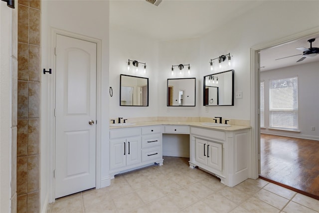 bathroom featuring vanity, tile patterned floors, and ceiling fan