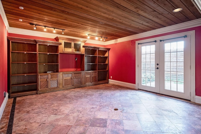 unfurnished living room featuring french doors, track lighting, ornamental molding, and wooden ceiling