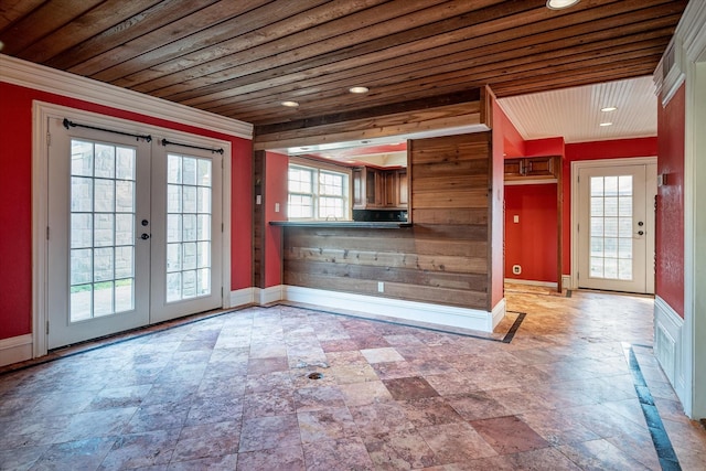 interior space with french doors and wooden ceiling