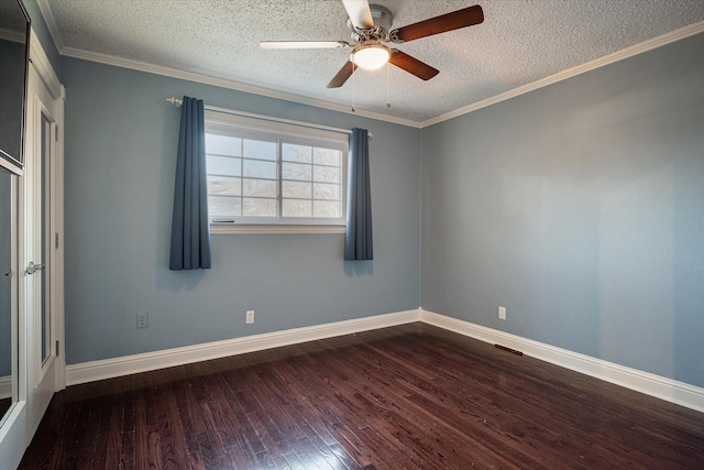 spare room with a textured ceiling, dark hardwood / wood-style floors, ceiling fan, and crown molding