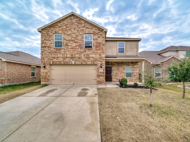 view of front property with a garage and a front lawn