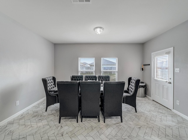 dining area with a healthy amount of sunlight