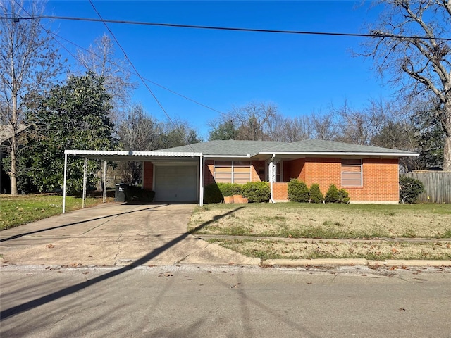 view of front of home with a front lawn and a carport