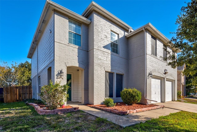 view of front of home with a garage