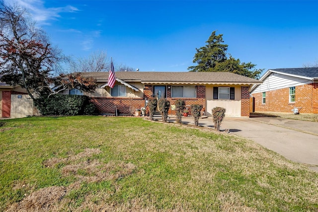 ranch-style home with a front lawn