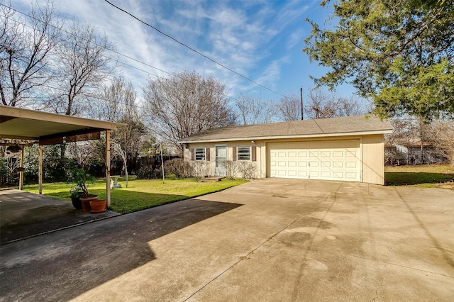 view of front of home featuring a front yard and a garage